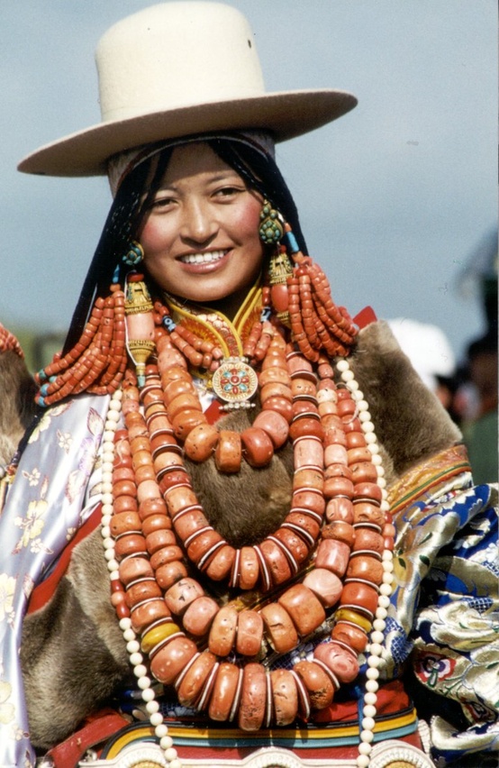 Как часть тибетского национального костюма.